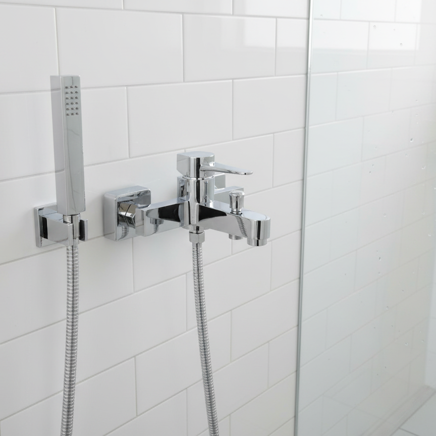 Modern shower mixer in glass enclosure