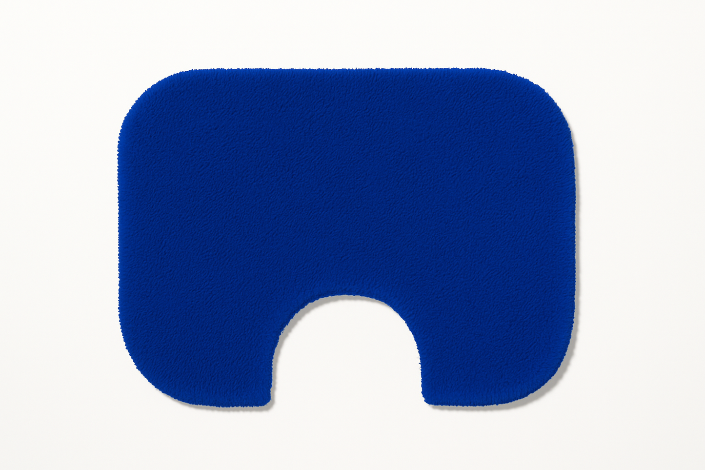 Solid blue U-shaped toilet mat